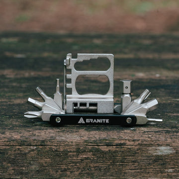 Granite Diverse 20 Multi Tool with various components on a wooden surface