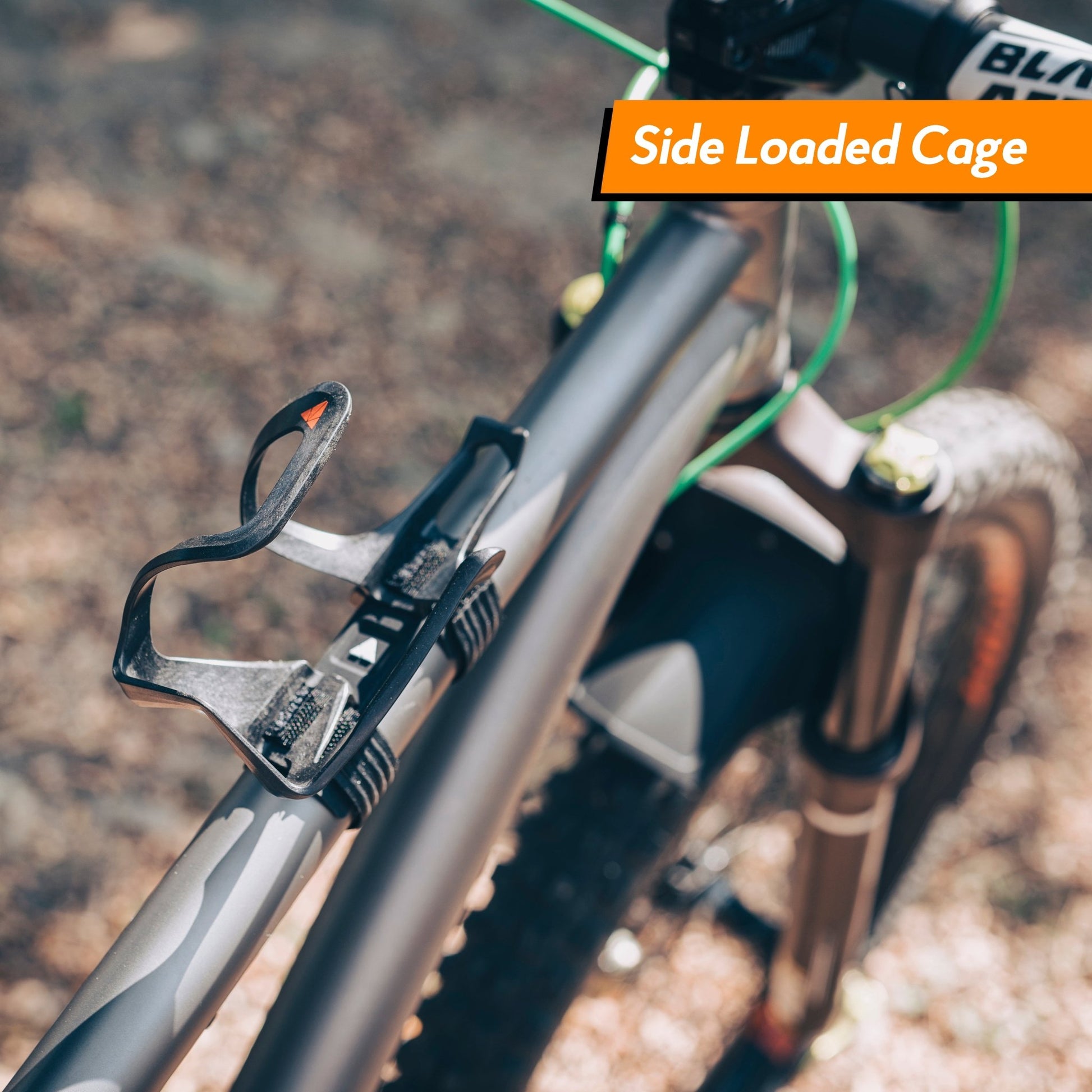 Side-loaded Aux Bottle Cage with Strap, allowing easy access from the side, making it convenient for narrow frame spaces.