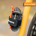 Granite Portaledge Strap Mount securing inner tube and tools on bike frame with paint-safe material.